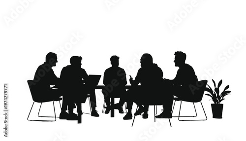Silhouettes of diverse professionals collaborating around a laptop during a modern business meeting.