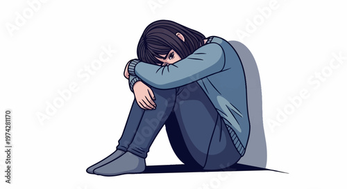 A person crouches, hugging knees with head bowed, expressing deep sadness