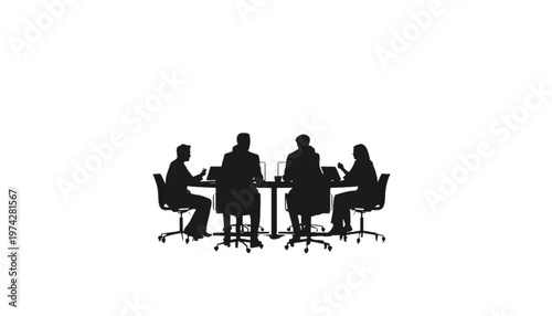 Four business colleagues sit around a conference table engaged in a productive discussion or strategic.