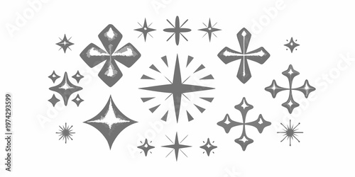 Collection of ornate black and white star and cross shaped graphic elements