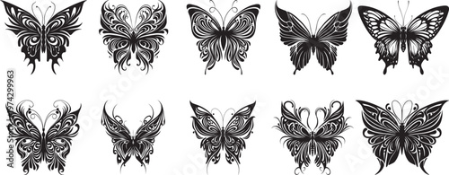 Set of ten intricate butterfly tribal tattoo silhouettes in black vector style with ornate filigree wings for design.