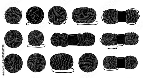 Collection of black yarn balls on white background for crafting and textile projects
