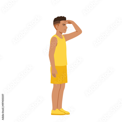 Man in yellow outfit looking ahead with hand on forehead standing