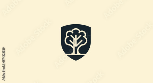 Elegant Tree Logo Design on Shield Representing Nature and Protection.