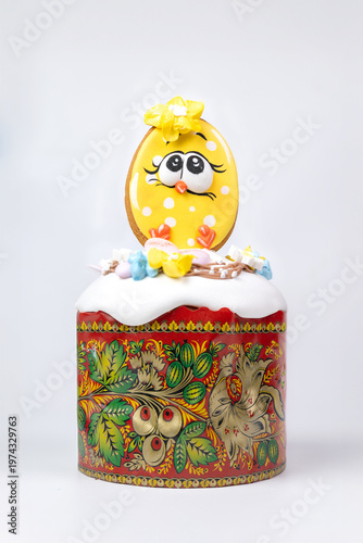 Easter Kulich in Painted Mold with Icing and Playful Gingerbread Egg Character