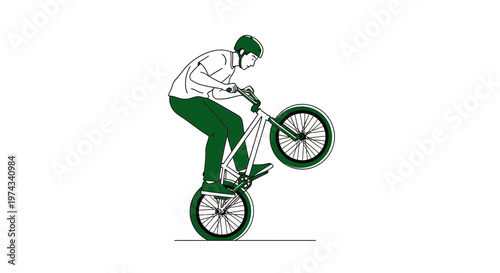 Dynamic BMX Rider Performing A Wheelie On Bicycle