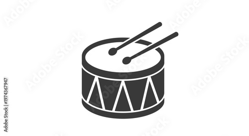 Black and white drum with sticks.