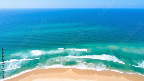 Aerial Turquoise Waves and Golden Sand Beach
