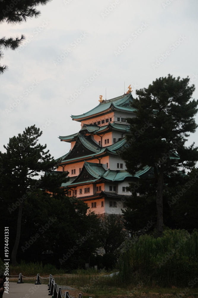 Obraz premium Historic Japanese Castle With Green Roof