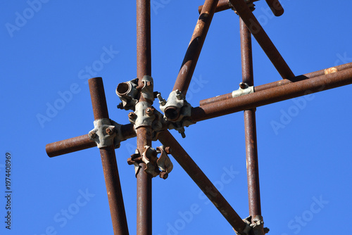 Detail of the Innocent pipes with fittings on a scaffolding