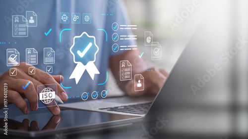 Digital quality assurance and compliance verification. businessman using laptop with digital quality checklist and ISO certification, document verification workflow, management and audit system