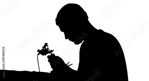 Tattoo Artist Silhouette Working with Machine