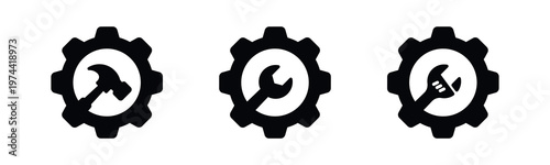 Black and white gear icons with tools silhouette including hammer wrench illustration