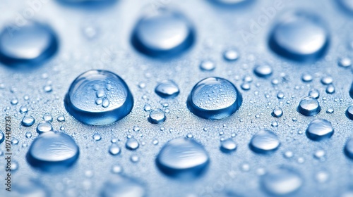 Close-Up of Water Droplets on a Smooth Surface, Macro Photography with Blue Hues and Reflections