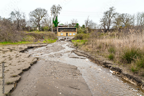 A road completely washed away after severe flooding