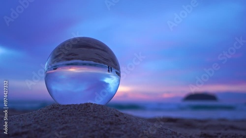 amazing view of the sea and sky in beautiful sunset are unconventional and beautiful inside crystal ball. 
A image for a unique and creative travel. 4K Videos for beautiful and unusual travel ideas.