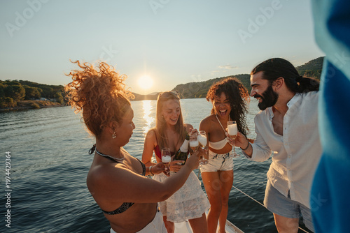 Photography Friends celebrating an outdoor boat party during sunset