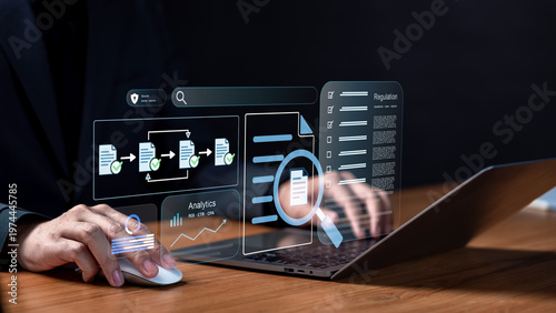 Business compliance regulation and document management analytics concept. Professional using laptop with holographic dashboard showing workflow automation, security controls and ROI metrics.