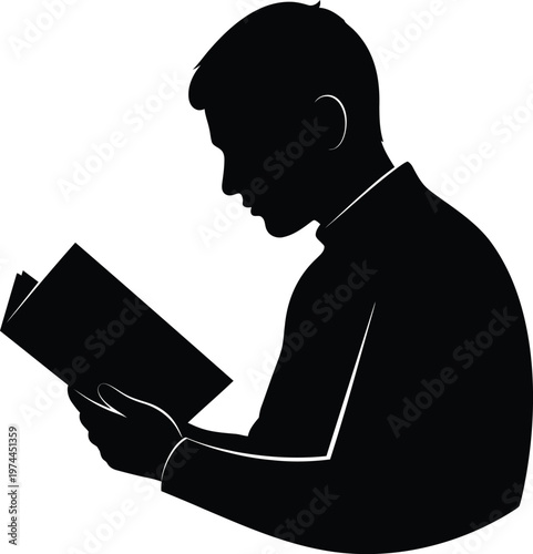 Silhouette of a man reading a book in profile