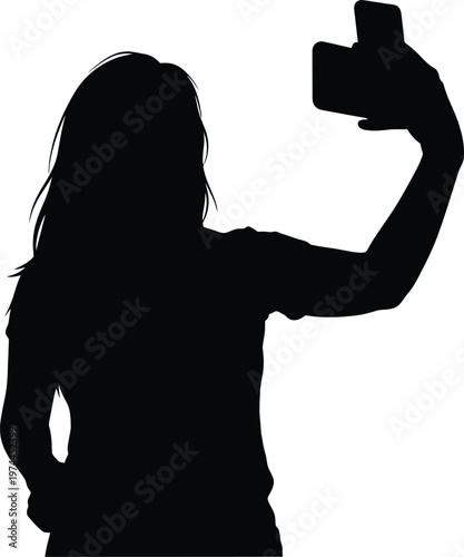 Silhouette of a woman taking a selfie with phone
