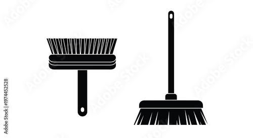 Black and white illustration of a floor brush and a handheld cleaning brush