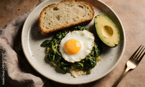 Wallpaper Mural Breakfast plate with spinach, fried egg, avocado, and bread   Torontodigital.ca