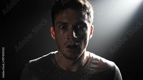 Mans Eyes Glow in Dark Room, Supernatural Transformation.