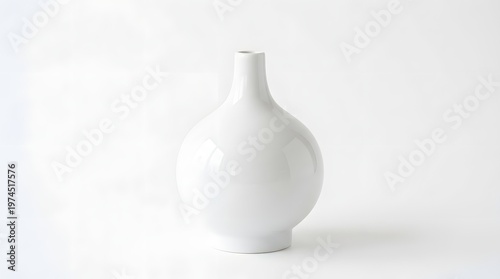 Elegant minimalist single white ceramic vase with a smooth glossy surface and a rounded bulbous body featuring a narrow neck and open top isolated on a clean bright white background