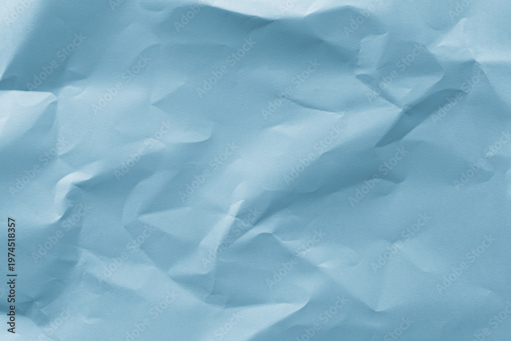 Obraz premium Textured blue crumpled paper background