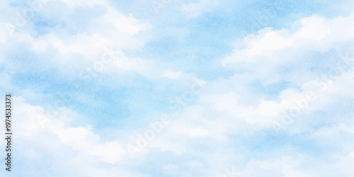 Blue sky with fluffy white clouds on a bright summer day