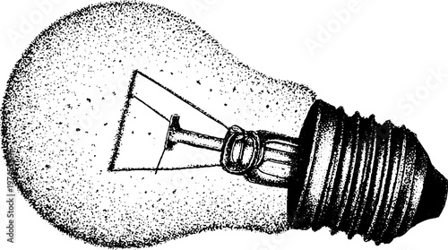 Incandescent light bulb lying on side on white background