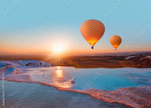 Obraz na plátně Hot air balloon flying over spectacular pamukkale - Natural travertine pools and terraces in Pamukkale