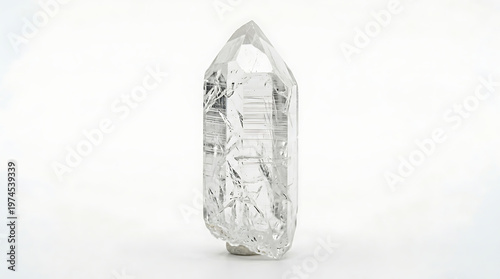 Clear Quartz Crystal Point Isolated on White Background Studio Shot