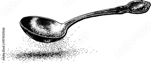 Metal spoon releasing granules over plain white background