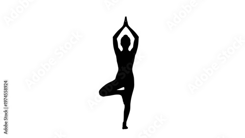 Woman in yoga tree pose silhouette.