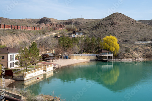Panoramic view of the coastline and rocky cliffs at Qonayev (Kapchagay), Central Asia