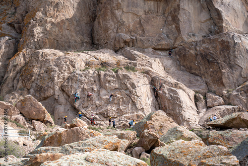 Majestic red rock formations and Buddhist petroglyphs site at Tamgaly Tas. Ili River landscape
