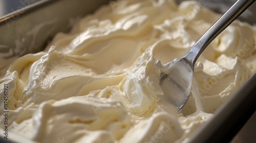 Wallpaper Mural Creamy white ice cream in a metal pan, a spoon stirring Torontodigital.ca