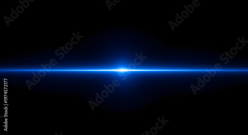 A bright blue light beam in a dark space