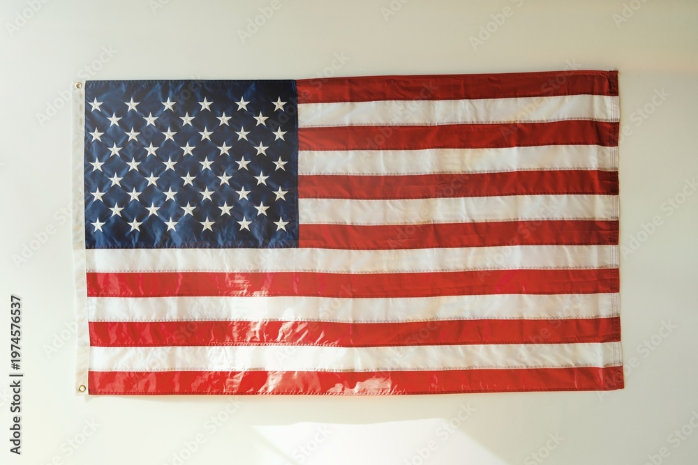 Obraz premium American flag with stars and stripes. US elections. Stars and stripes symbolize the United States. Patriotic American flag display. 2024 US elections, voting democracy.