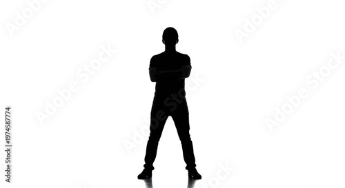 Silhouette of a confident man with arms crossed against a white background