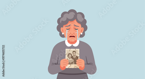 An elderly woman with gray hair crying while holding a torn vintage photograph