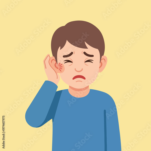 A distressed young boy touching his ear, indicating pain and medical discomfort