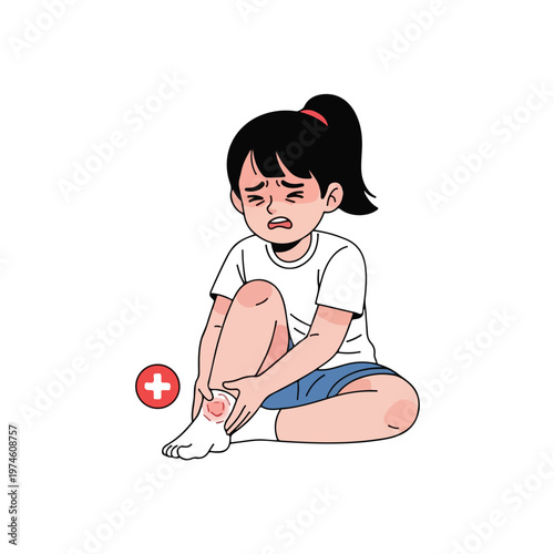 A crying young girl sits on the floor holding her painful, injured swollen ankle
