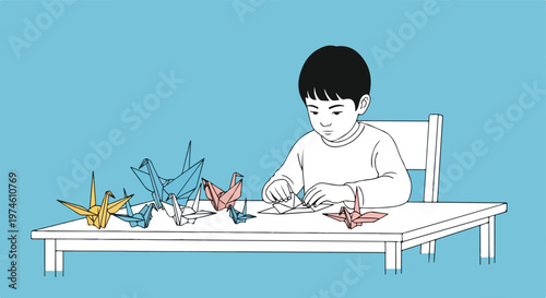 A young boy sitting at a table folding colorful paper origami crane sculptures