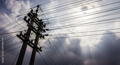 Power lines against a cloudy sky.