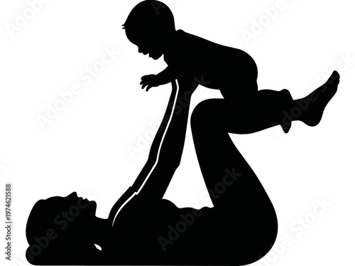 A tender moment of a mother playfully lifting her baby. The silhouette captures the pure joy and loving bond between them