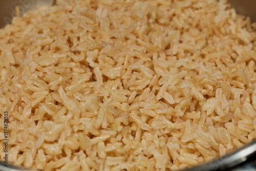 a pot of cooked, brown jasmine rice