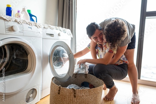 Fotografie Joyful laundry day together photo
