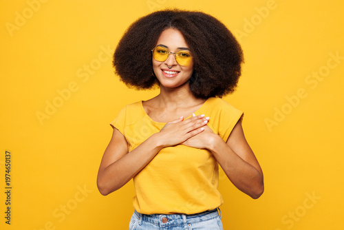Canvas Print Young grateful smiling happy woman of African American ethnicity she wear t-shir